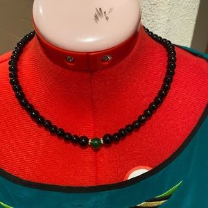 Necklace black shiny beads with green Centerstone